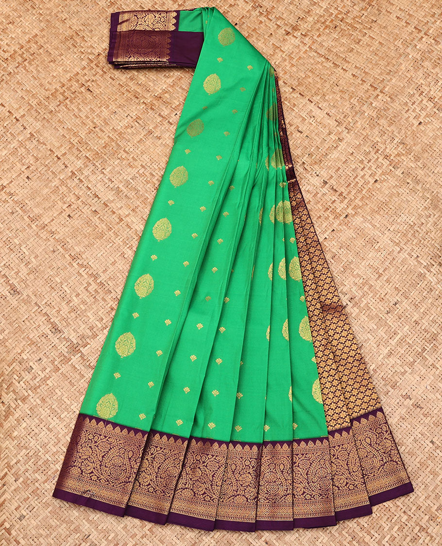 Green Budget Silk Saree, Elevated with Zari Buttas All Over Its Body, Complemented by a Contrast Traditional Zari Border of Paisley Designs, Grand Jaal Pallu, and Paired with a Contrast Blouse