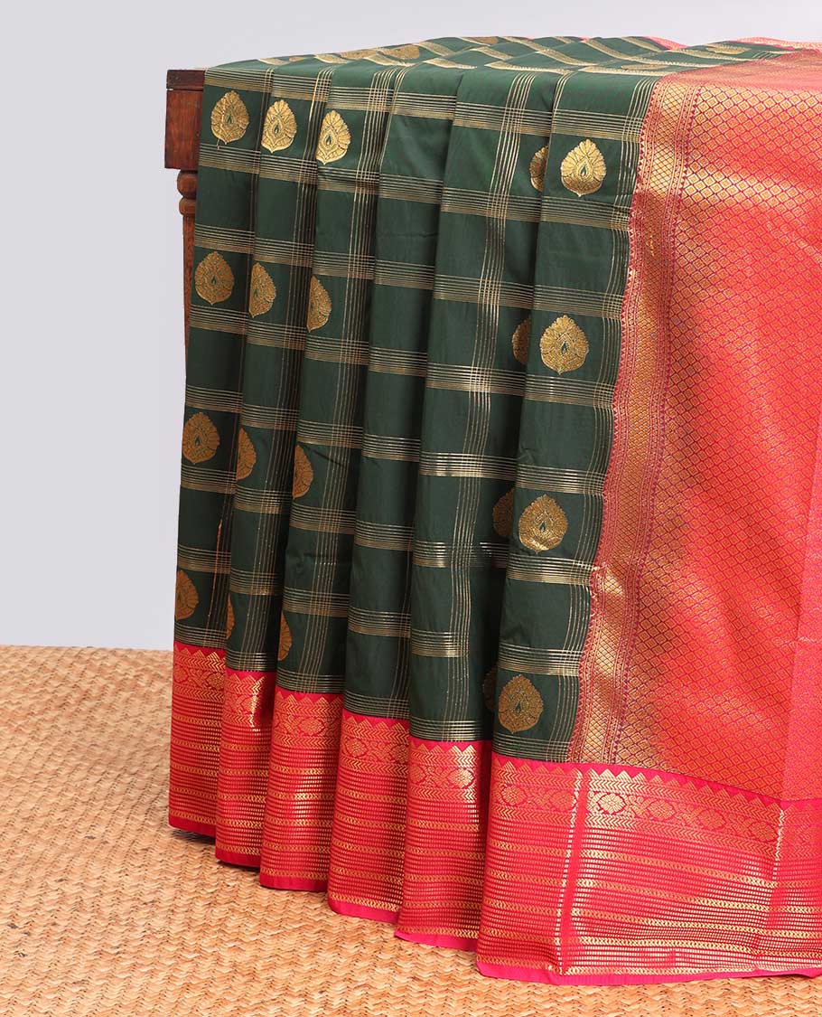 Green leaf motifs enclosed checked design gift saree with contrast intricate zari design border & checked zari design pallu