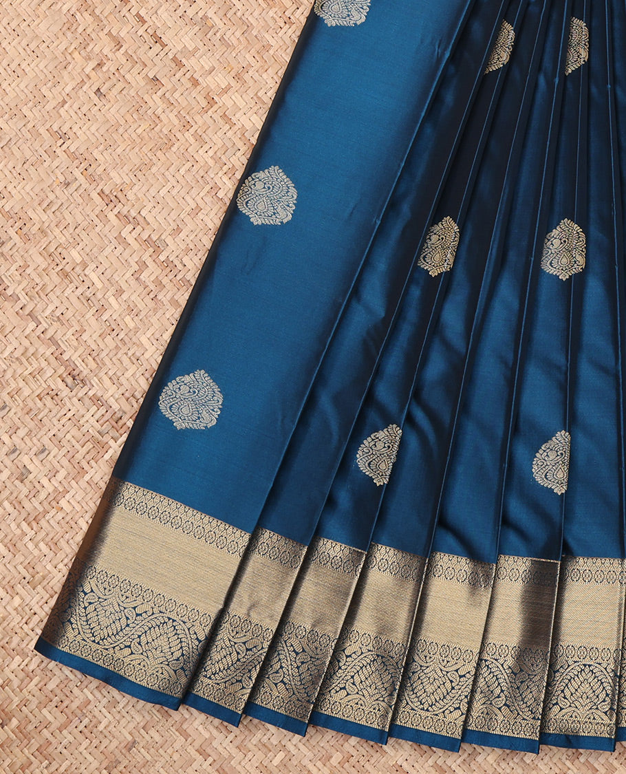 Peacock Blue Budget Silk Saree, Delicately Woven with Zari Buttas, Highlighted by a Traditional Zari Border, Jaal Pallu, and Matching Blouse