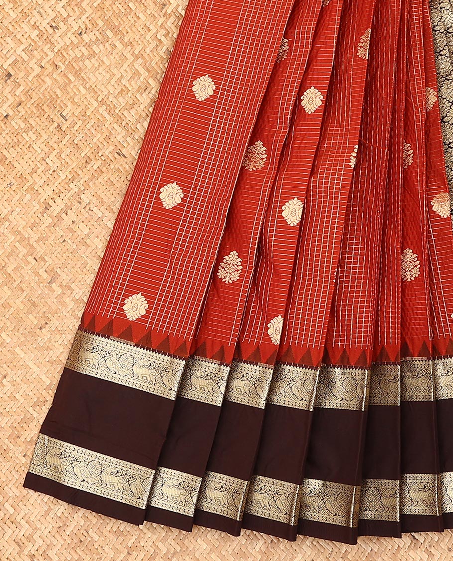 Red buttas and checked gift saree, contrast temple rettai pettu border of traditional zari designs, and zari-rich pallu