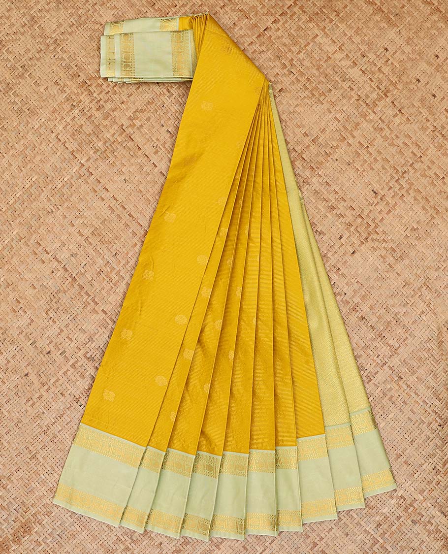 Yellow zari buttas and striped gift saree, contrast traditional zari design rettai pettu border, and jaal pallu