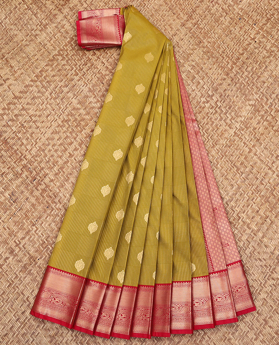 Green Budget Silk Saree, Beautifully Bedecked with Buttas All Over Its Body, Complemented by a Contrast Traditional Zari Border of Paisley Designs, Grandly Detailed Pallu, and Paired with a Contrast Blouse