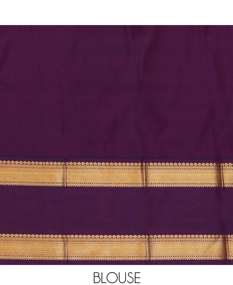 Green Budget Silk Saree Ornamented with Zari Buttas, Highlighted with Contrast Traditional Zari Design Woven Rettai Pettu Border, Zari Elevated Jaal Pallu, and a Paired with a Contrast Blouse