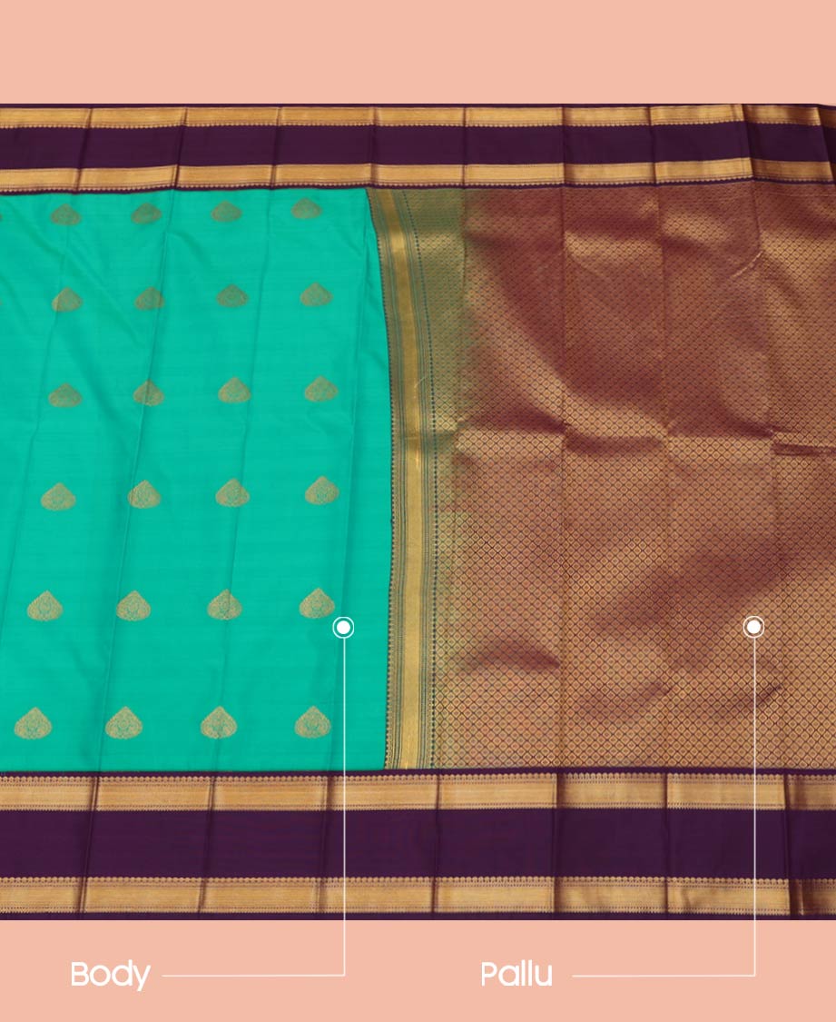 Green Budget Silk Saree Ornamented with Zari Buttas, Highlighted with Contrast Traditional Zari Design Woven Rettai Pettu Border, Zari Elevated Jaal Pallu, and a Paired with a Contrast Blouse