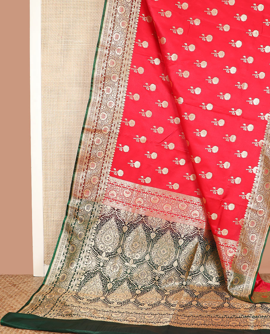 Red floral buttas banarasi silk saree, contrast floral creeper design border, and Mughal-style designs woven pallu