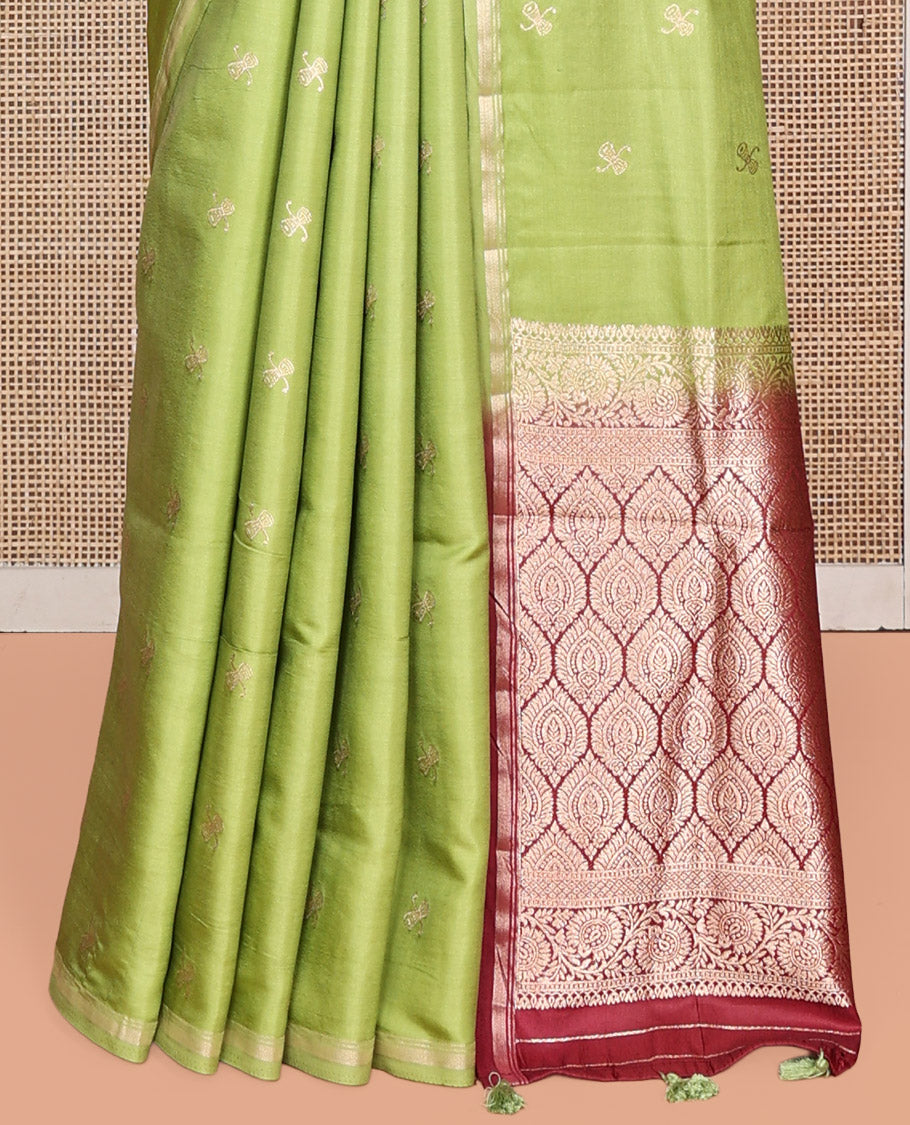 Leaf Green Satin Silk Saree, Enthralled with Zari Buttas, a Subtle Piping Border, Complemented by a Contrast Intricately Designed Pallu, and a Contrast Blouse