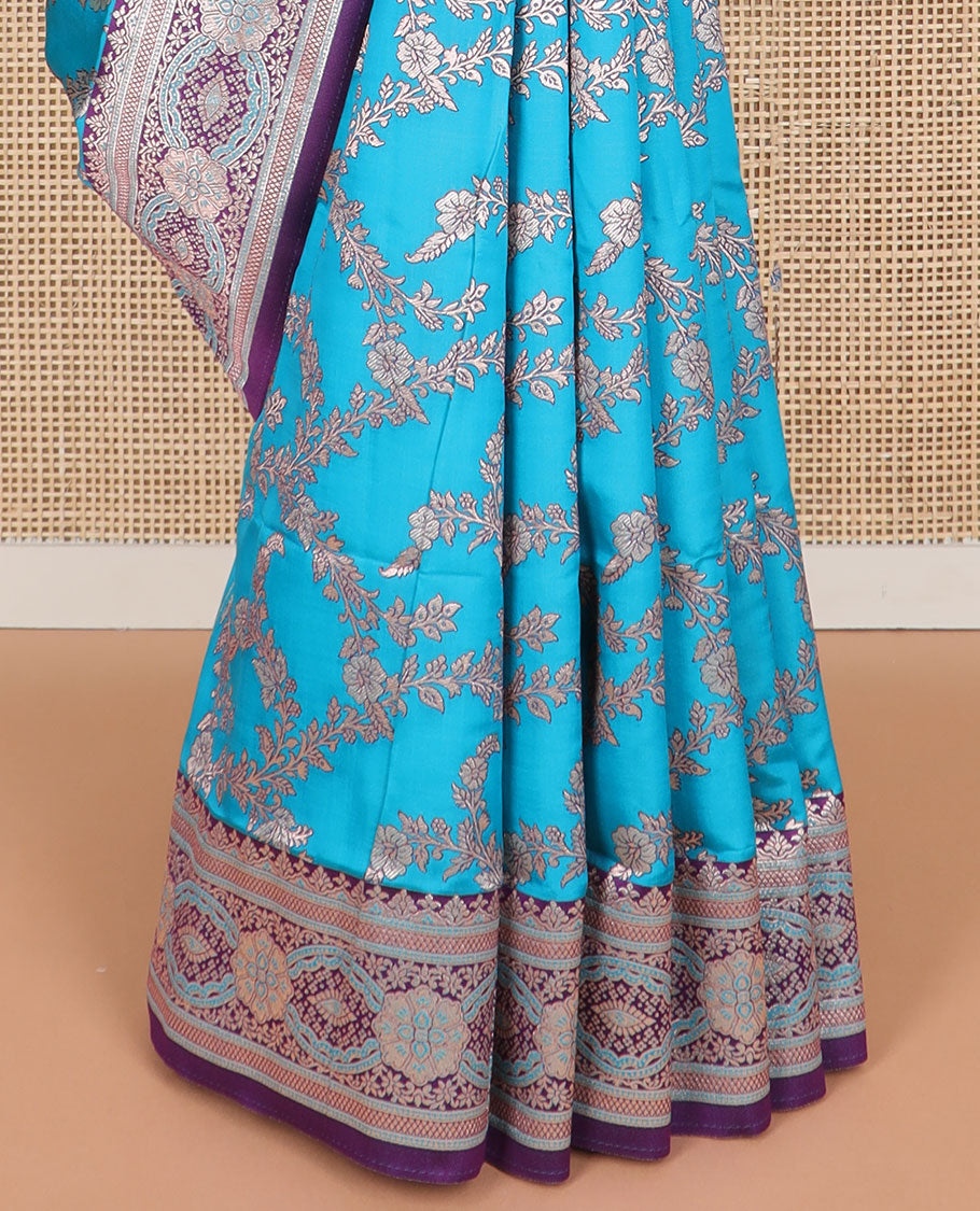 Sky blue floral jaal design butter silk saree with contrast intricate zari design border & floral design pallu