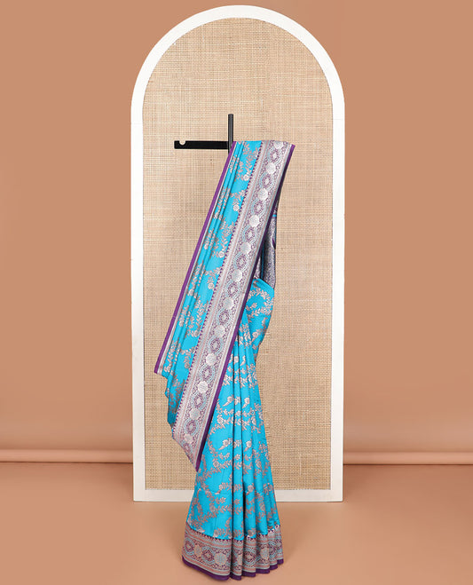 Sky blue floral jaal design butter silk saree with contrast intricate zari design border & floral design pallu