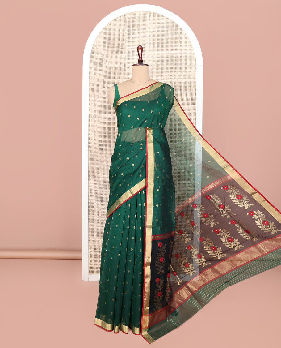 Green Chanderi Cotton Saree, Spotlighted with Zari Buttas All Over Its Body, Highlighted by Zari Border, Pallu of Floral Buttas, and Paired with a Contrast Blouse