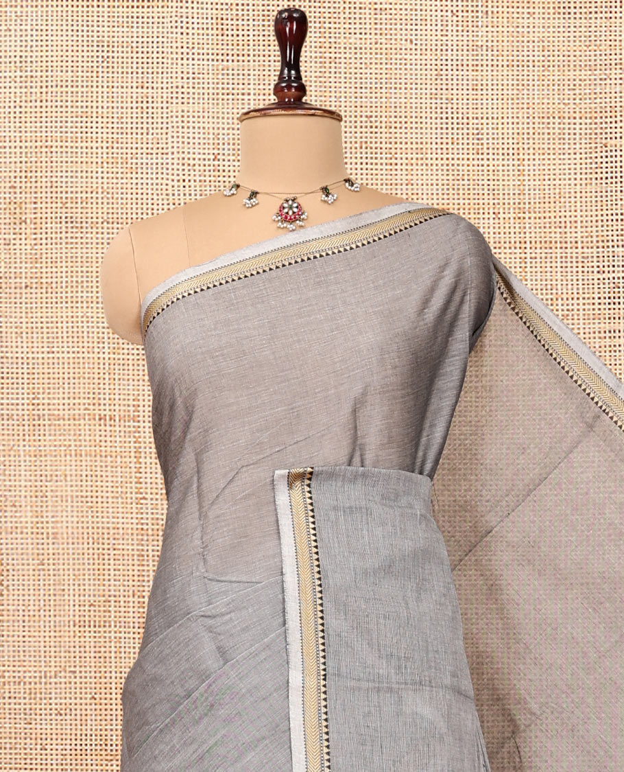 Grey Plain Chettinad Cotton Saree, a Temple Traditional Thread Piping Border, Striped Pallu, and a Matching Blouse