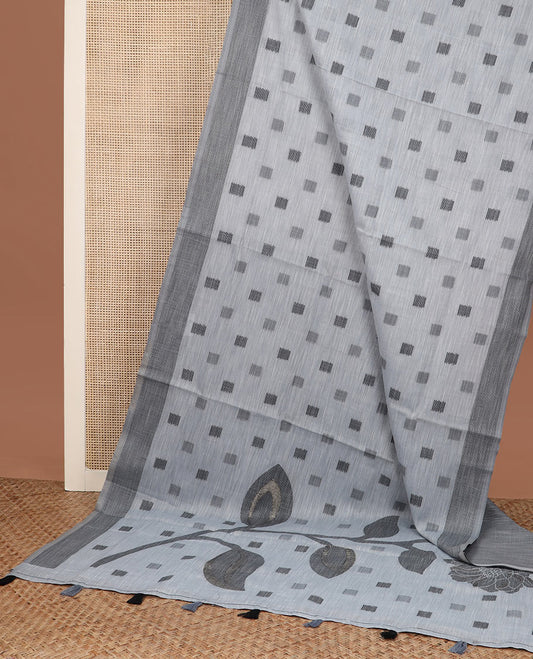 Grey square buttas woven cotton saree, contrast plain border and pallu features a pink flower with stem motifs