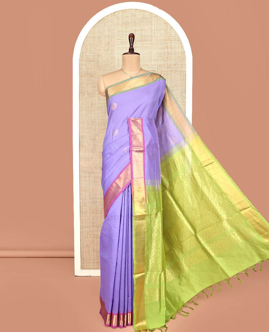 Lavender Poly Cotton Saree, Enthralled with Zari Buttas on Its Body, Complemented by Contrast Ganga-Jamuna Border, Chevron Striped Pallu, and Paired with a Contrast Blouse