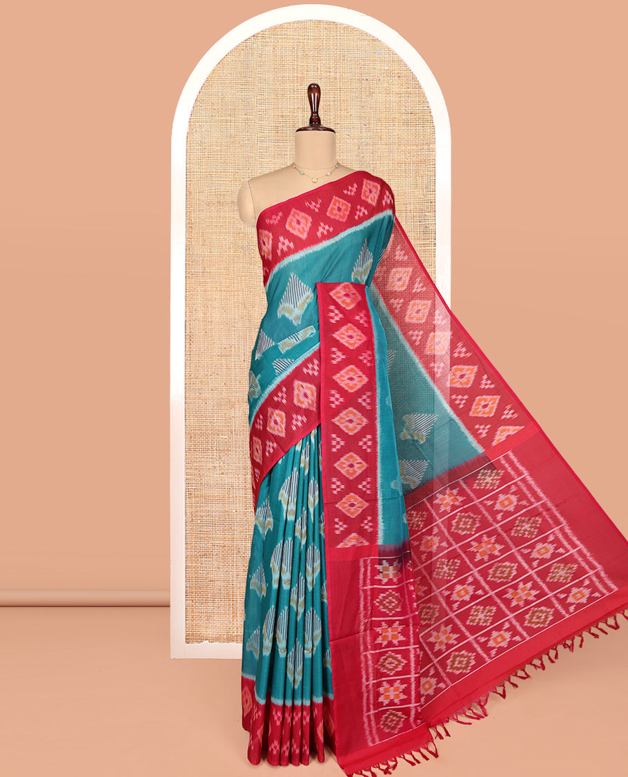 Blue Ikkat Cotton Saree, Decorated with Ikkat-style Buttas All Over Its Body, Complemented by a Contrast Ikkat-Textured Border, Pallu of Butta Enclosed Checks, and Paired with a Contrast Blouse