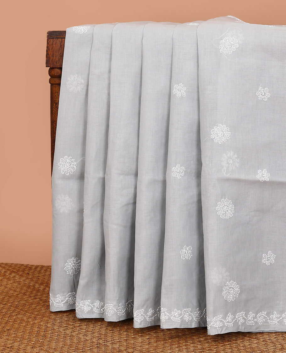 Grey floral thread embroidered buttas Lucknowi chikankari saree, floral creeper thread embroidered border, and floral embroidered pallu
