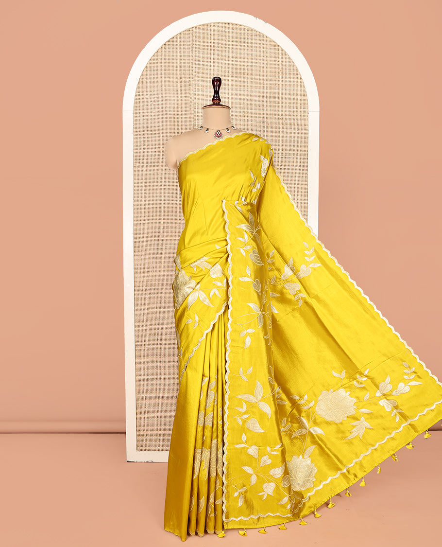 Mustard Yellow Dupion Silk Saree, Delicately Decked Up with Floral-Leaf Vine Embroidered On Its Body, Subtle Scallop Border, Artfully Floral Embroidered Pallu, and Paired with a Plain Blouse