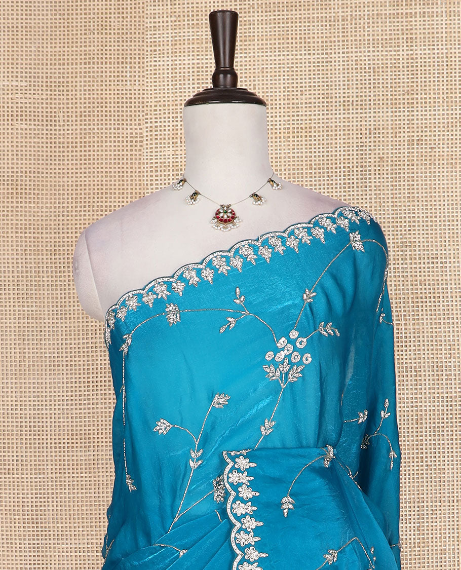 Blue stone and kardana floral vine embroidered designer saree, scallop stone work border