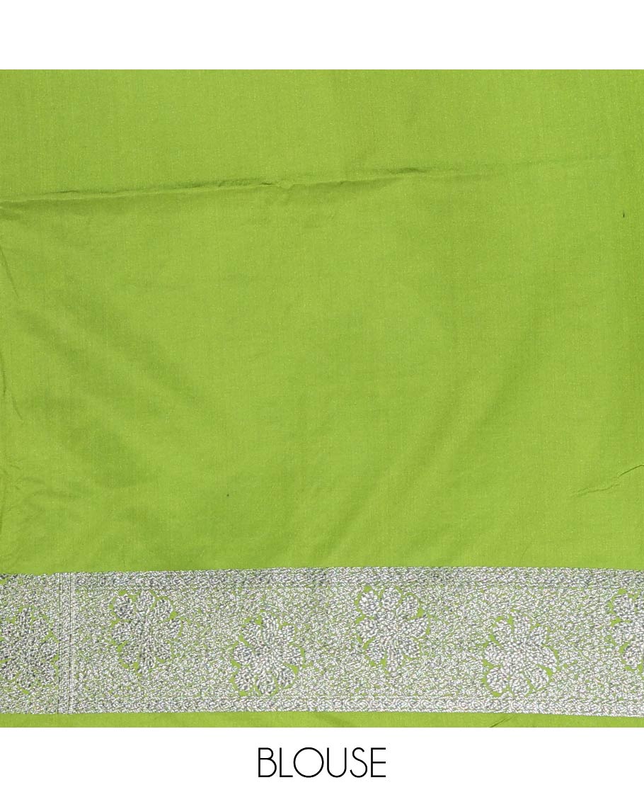 Green Fancy Georgette Saree Adorned with Vertically Zari Stripes, Hazily Zari Woven Border, Hazily Woven Pallu of Intricate Designs, and Paired with a Matching Blouse