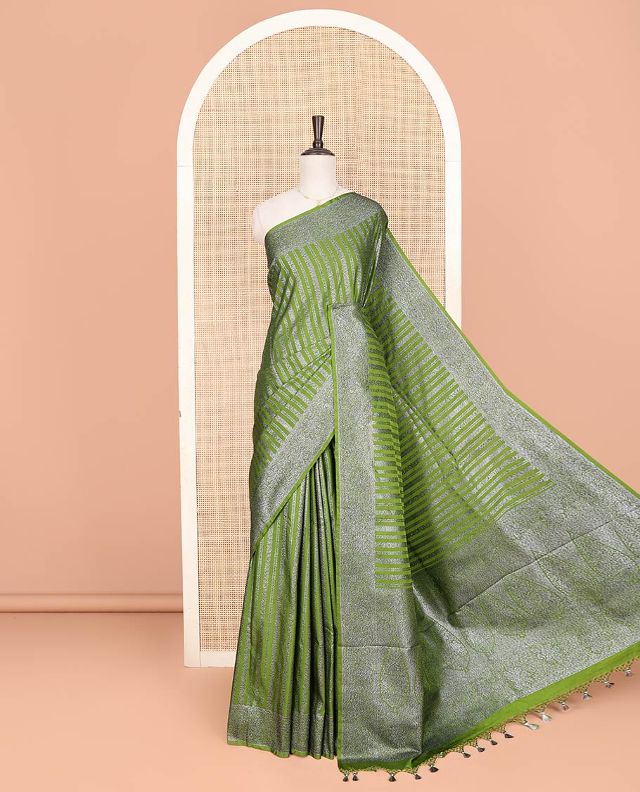 Green Fancy Georgette Saree Adorned with Vertically Zari Stripes, Hazily Zari Woven Border, Hazily Woven Pallu of Intricate Designs, and Paired with a Matching Blouse