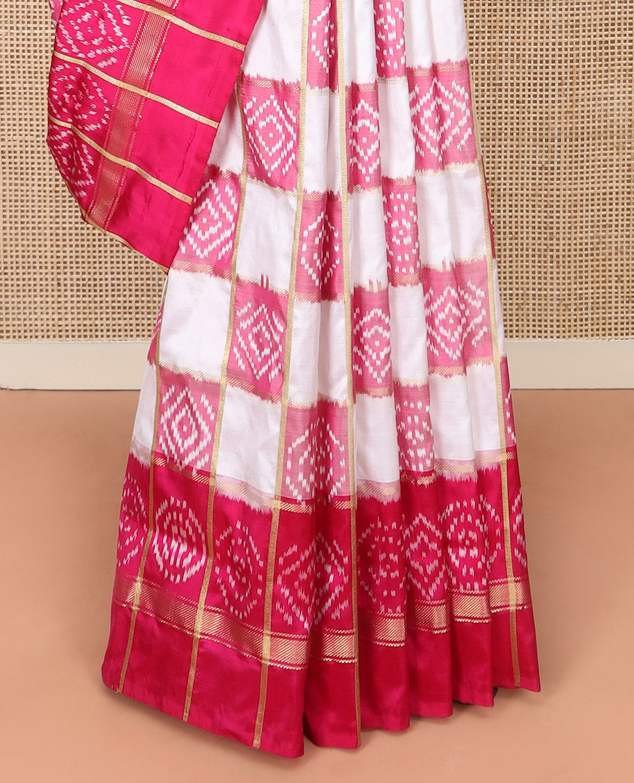 Cream and Pink Ikkat Silk Saree with Ikkat Buttas Enclosed in Checks, Complemented by a Contrast Ikkat Design Border, a Hazily Woven Pallu of Ikkat Patterns, and a Contrast Checked Blouse