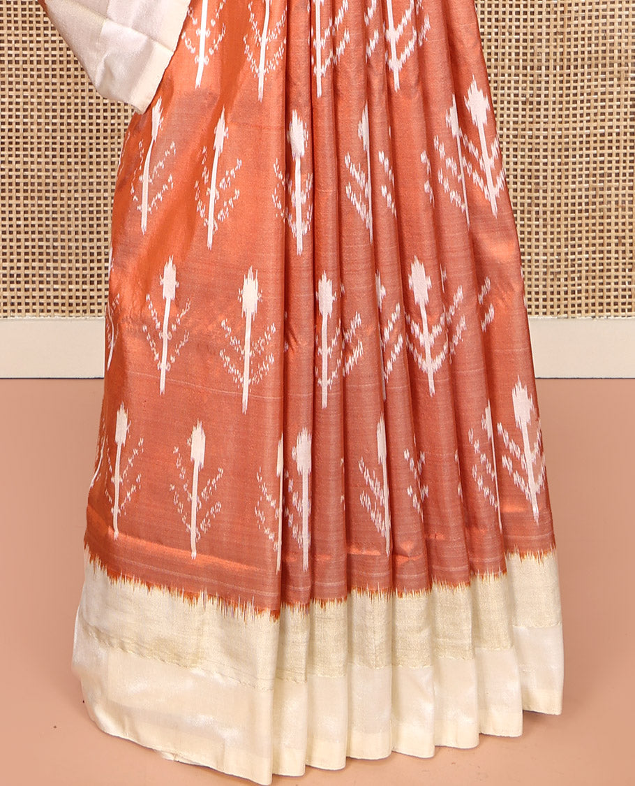 Peach Pochampally Ikat Silk Saree, Subtly Sparkled with Floral Ikkat Buttas on Its Body, Complemented by a Contrast Border, Pallu of Jaal-Pattern in Ikkat Weave, and Paired with a Contrast Blouse