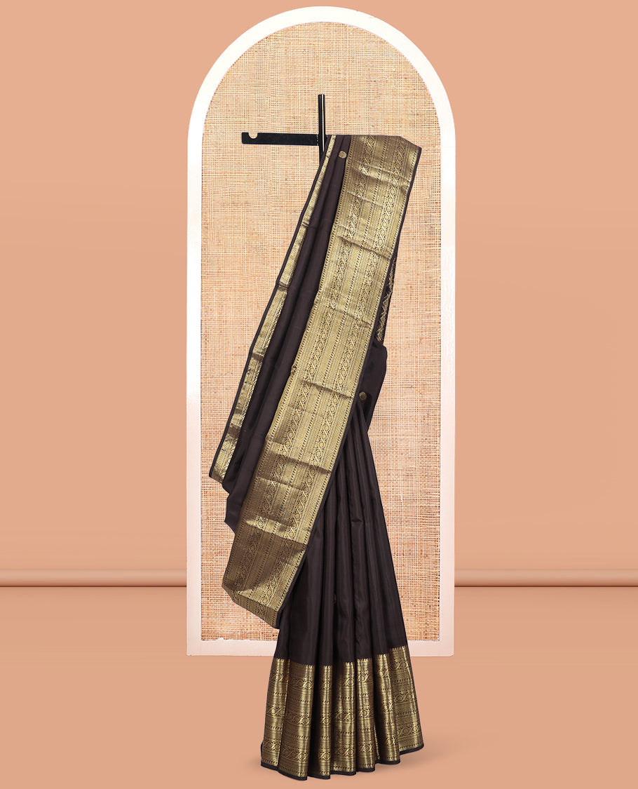 Brown Kanchipuram Silk Saree, Elevated with Zari Buttas, Highlighted by Zari Border of Manga, Paisa, Diamond, Neli, Cross Kamalam, Kathir, and Cross Neli, Jaal Pallu, and a Matching Blouse
