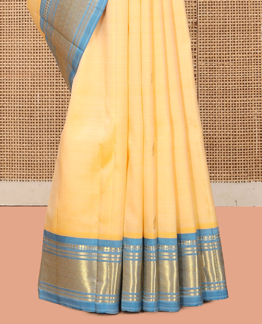Pale Yellow Kanchipuram Silk Saree, Sparsely Woven with Zari Buttas, a Contrast One-Sided Border of Panner Sombu, Banaras, and Jaal Designs, a Zari Design Pallu, and No Blouse