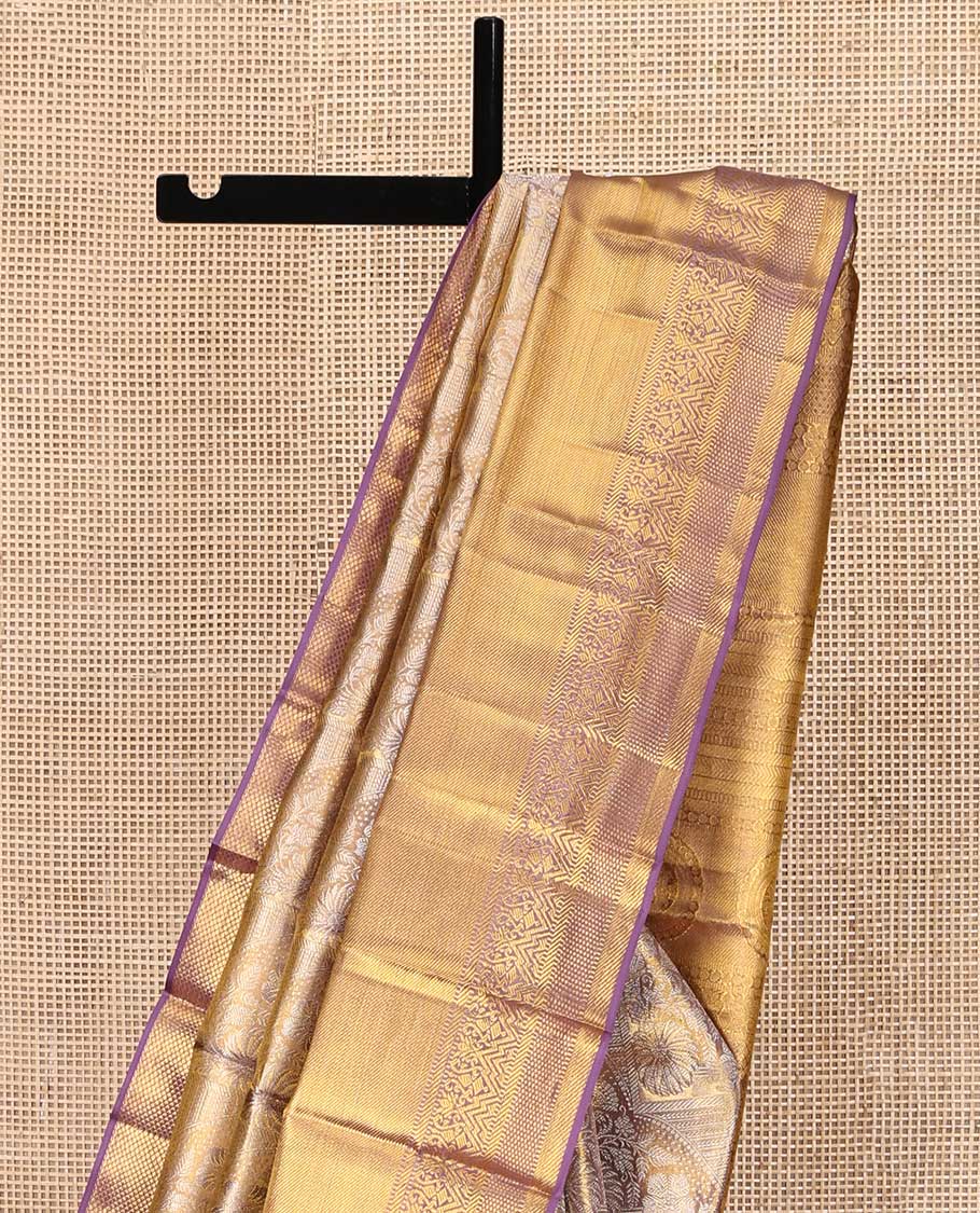 Grey-Gold Kanchipuram Tissue Silk Saree, Richly Detailed with Jacquard Design On Its Body, Complemented by Contrast Traditional Zari Designs Woven Border, Grandly Zari Designed Pallu and Paired with a Contrast Blouse