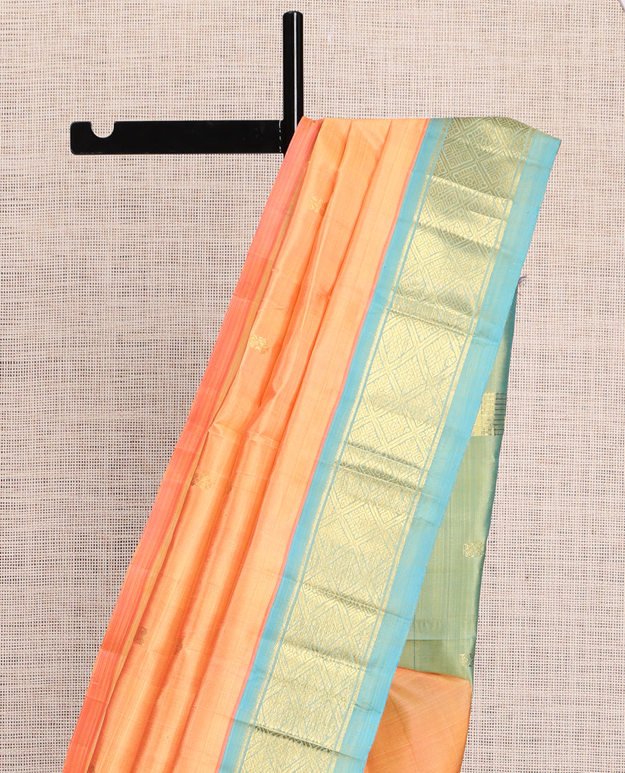 Orange Kanchipuram Silk Saree, Accentuated with Zari Buttas, a Contrast One-Sided Border of Banaras and Jaal Design, Zari Design Pallu, and No Blouse