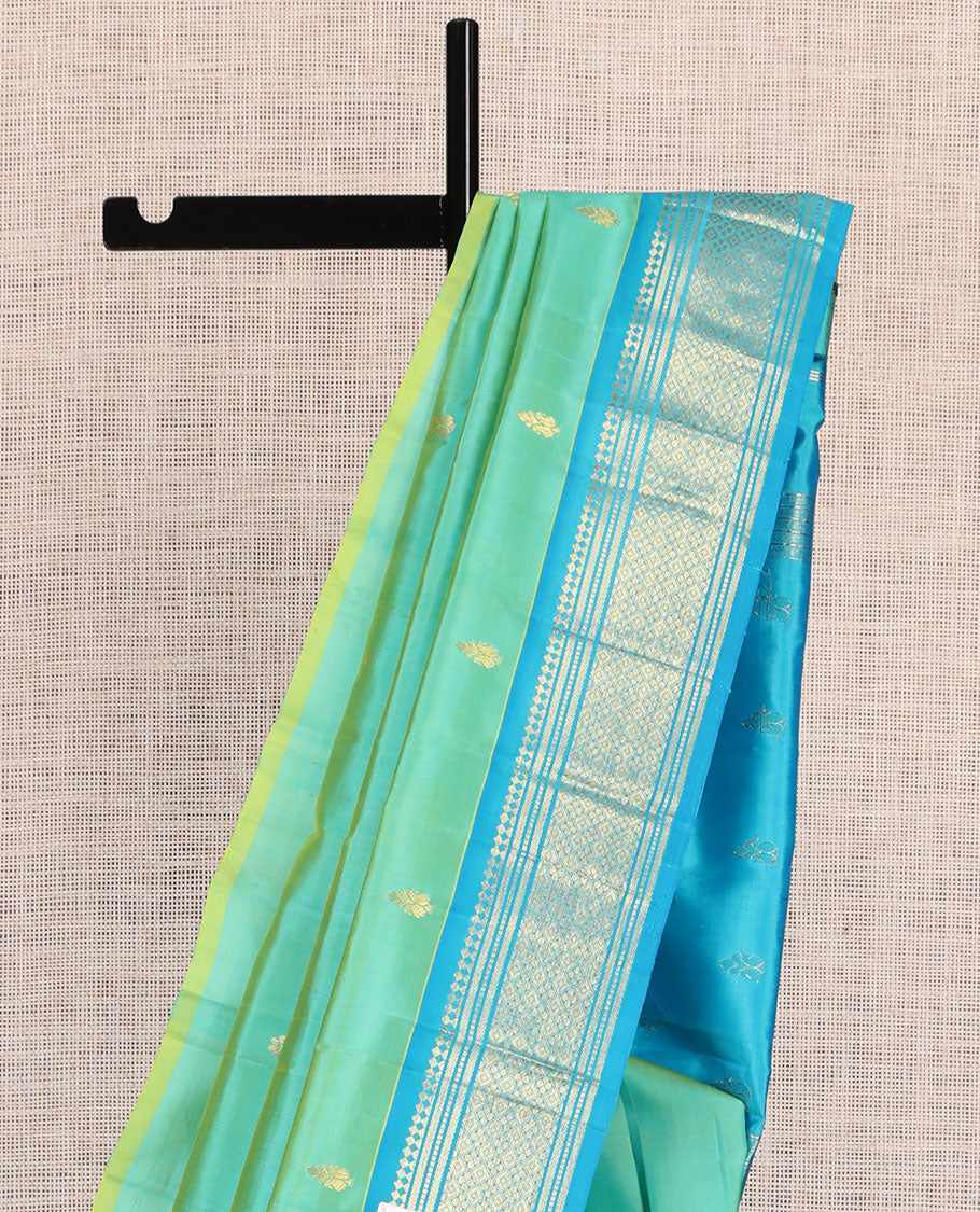 Turquoise Kanchipuram Silk Saree, Woven with Zari Buttas, a Contrast One-Sided Border of Panner Sombu, Banaras, Muthu, and Jaal Designs, Zari Design Pallu, and No Blouse