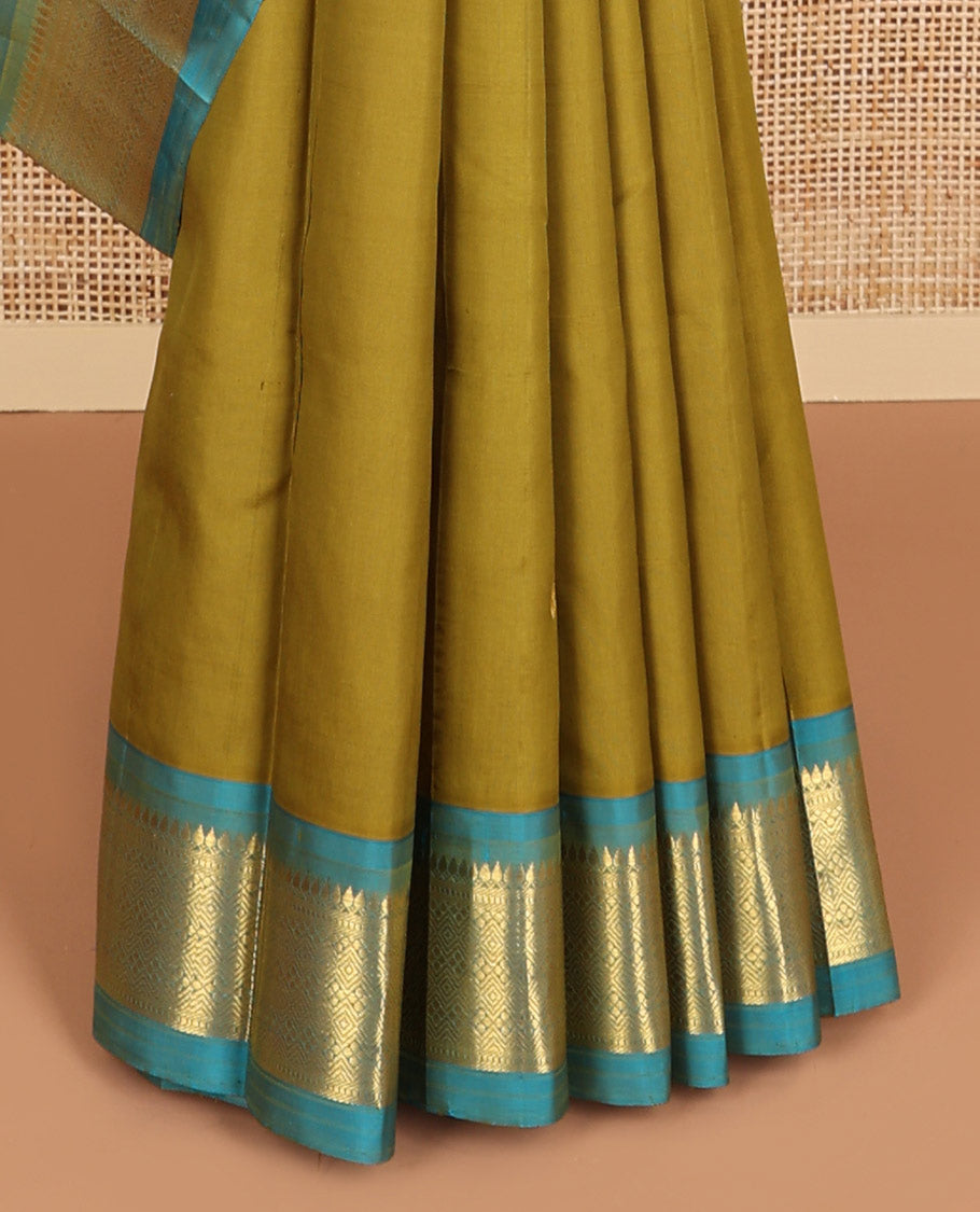 Green buttas kancheepuram silk saree with contrast korvai intricate zari design border & floral design pallu