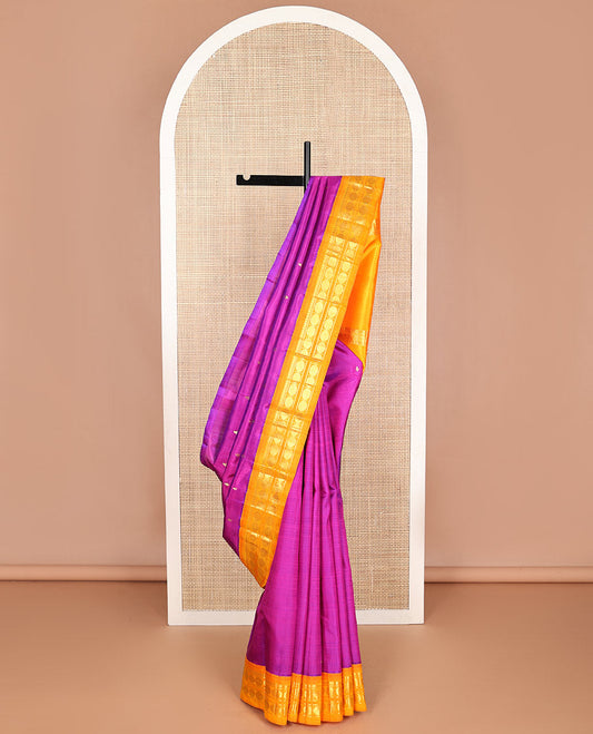 Purple buttas kancheepuram silk saree with contrast korvai border of thilakam mokku, paun design & zari design pallu