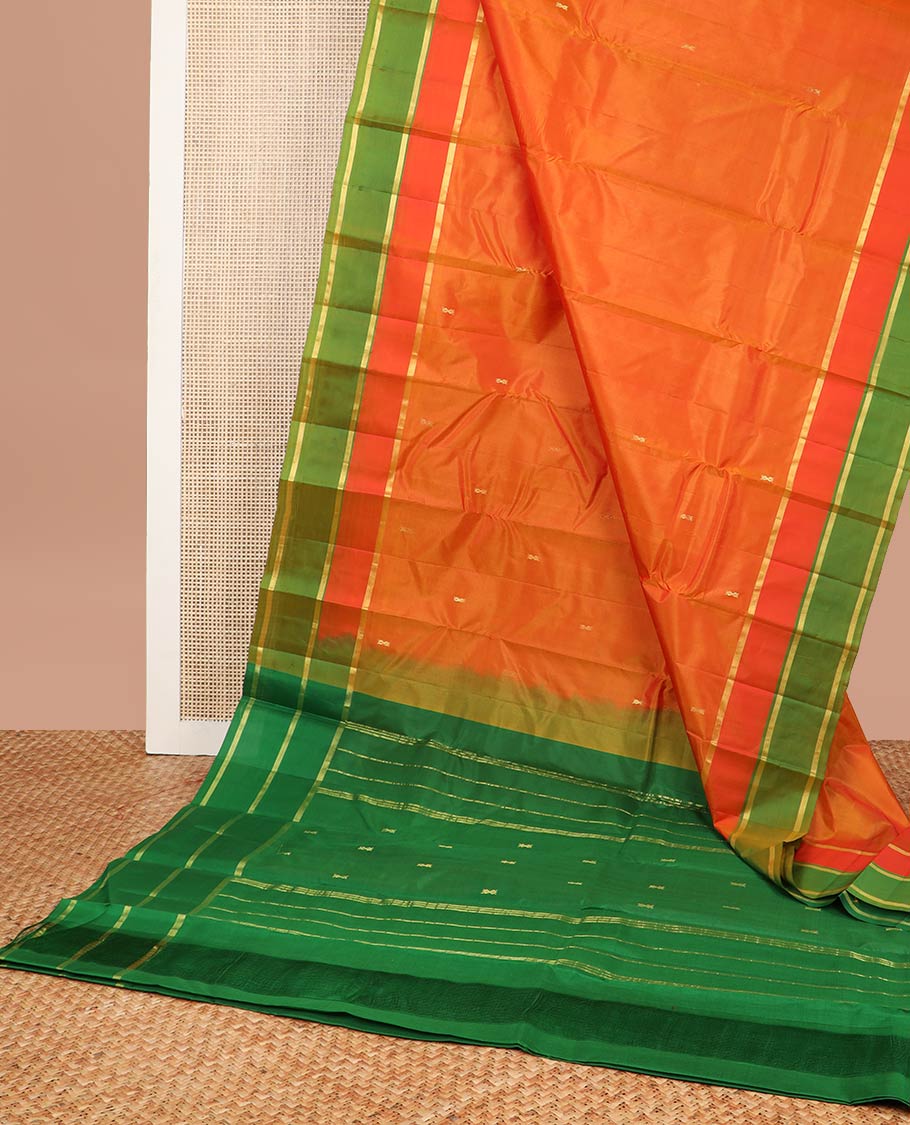 Orange buttas kancheepuram silk saree with contrast zari border & striped, floral motifs pallu
