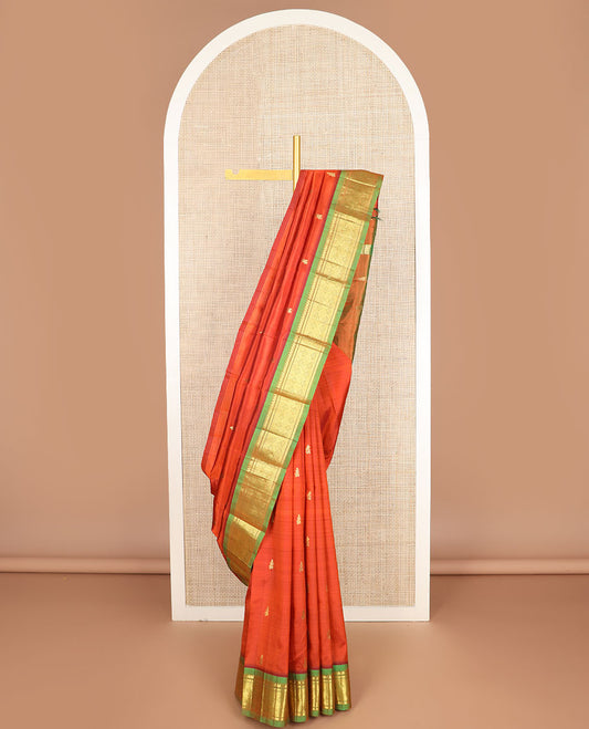 Orange zari buttas Kanchipuram silk saree, contrast one-sided border of thilakam mokku,banaras & jaal & zari design pallu