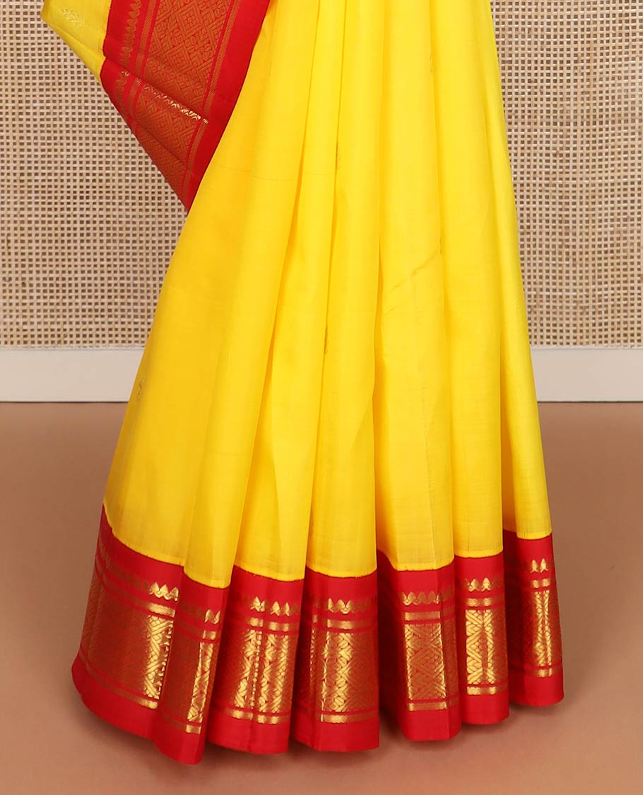 Yellow zari buttas kanchipuram silk saree, contrast korvai one-sided zari border of salngai & jaal & zari design pallu