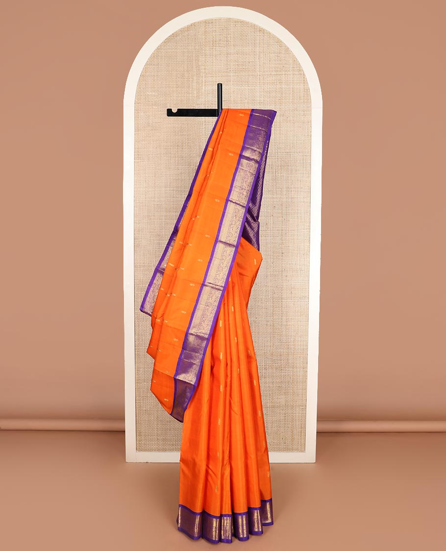 Orange zari buttas Kanchipuram silk saree, contrast korvai border of manga mokku, muthu, zari stripes, and kili motifs, and jaal pallu