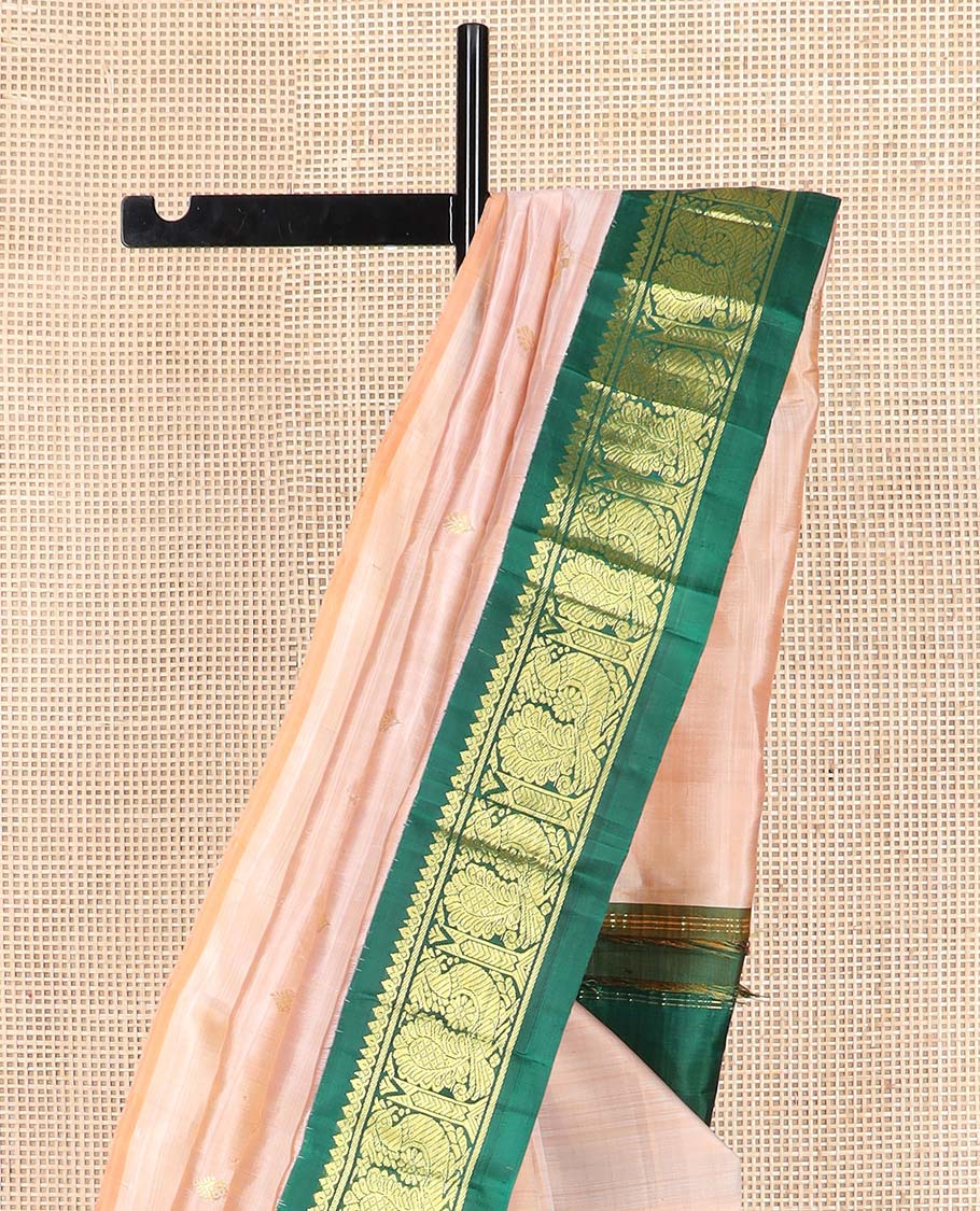 Sandal zari buttas Kanchipuram silk saree, contrast one-sided korvai border of thilakam mokku, and mayil designs, and floral design pallu