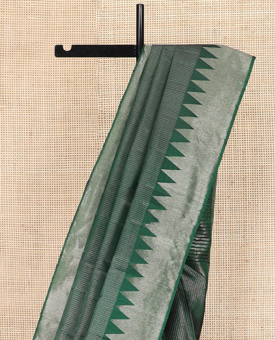 Green micro-checked Kanchipuram silk saree, thazampoo rekku zari border, and pallu of seppu rekku designs