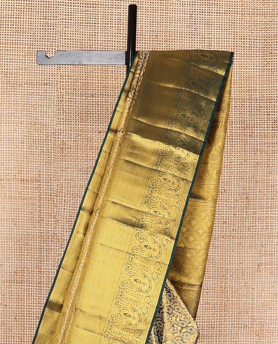 Green floral jacquard kancheepuram silk saree with contrast border of thilakam mokku, muthu, kathir, kuyil kann design & zari design pallu