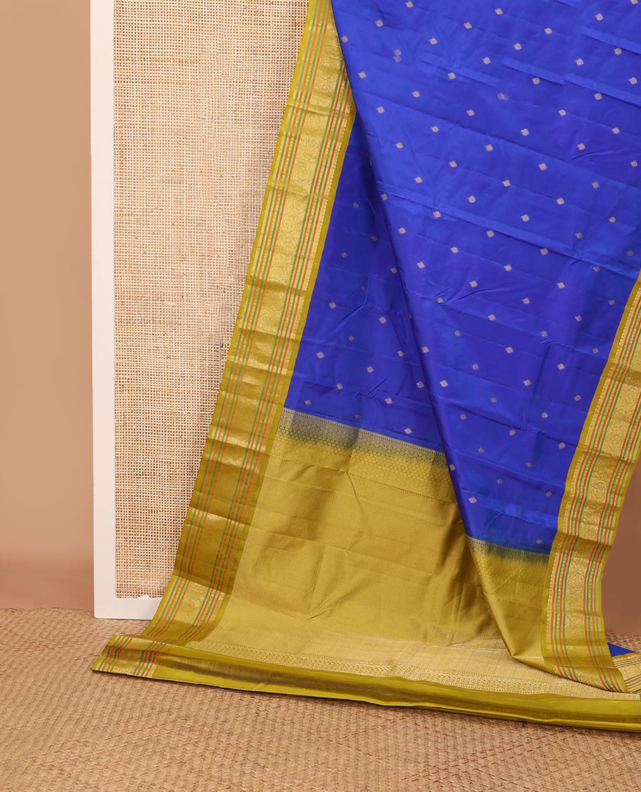 Blue zari buttas silk saree, contrast border of muthu,mayil kann,poun,kathir & floral design & neli striped pallu