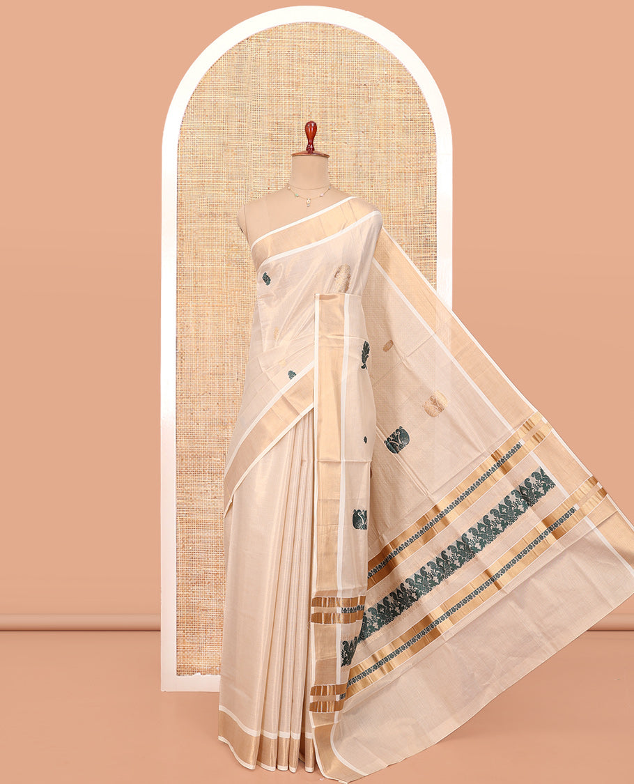 Cream Kerala Cotton Saree, Decorated with Zari Buttas All Over Its Body, a Zari Bavanji Border, Pallu of Intricate Designs, and Paired with a Matching Blouse