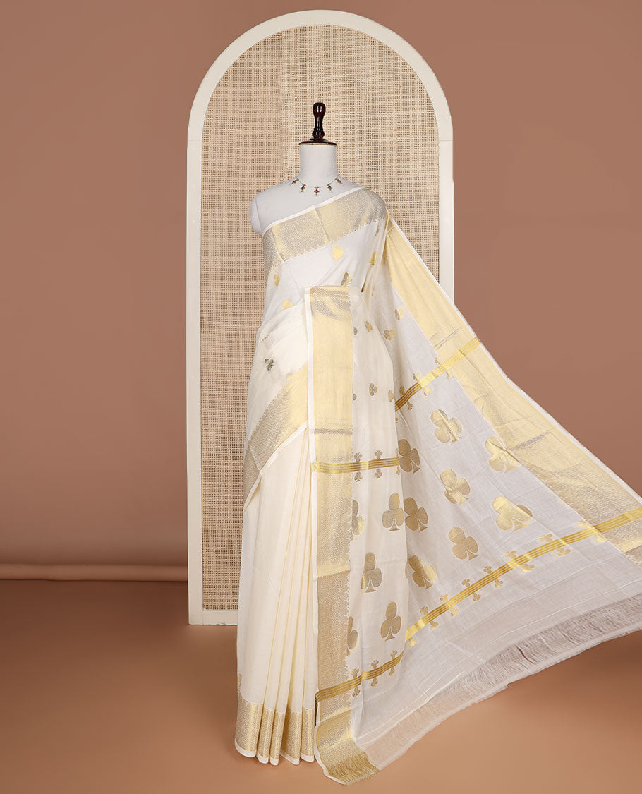 Cream club motifs zari woven Kerala saree, traditional zari border, and pallu steeped with clubs