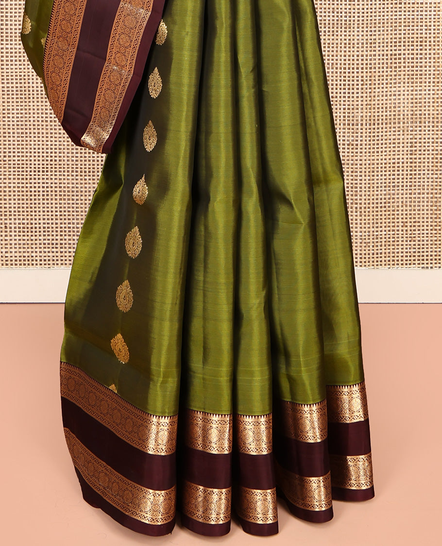 Green Mayuri Lite Silk Mix Saree, Ornamented with Zari Buttas All Over Its Body, Complemented by Contrast Zari Rettai Pettu Traditional Border, Floral Jaal Pallu, and Paired with a Contrast Blouse