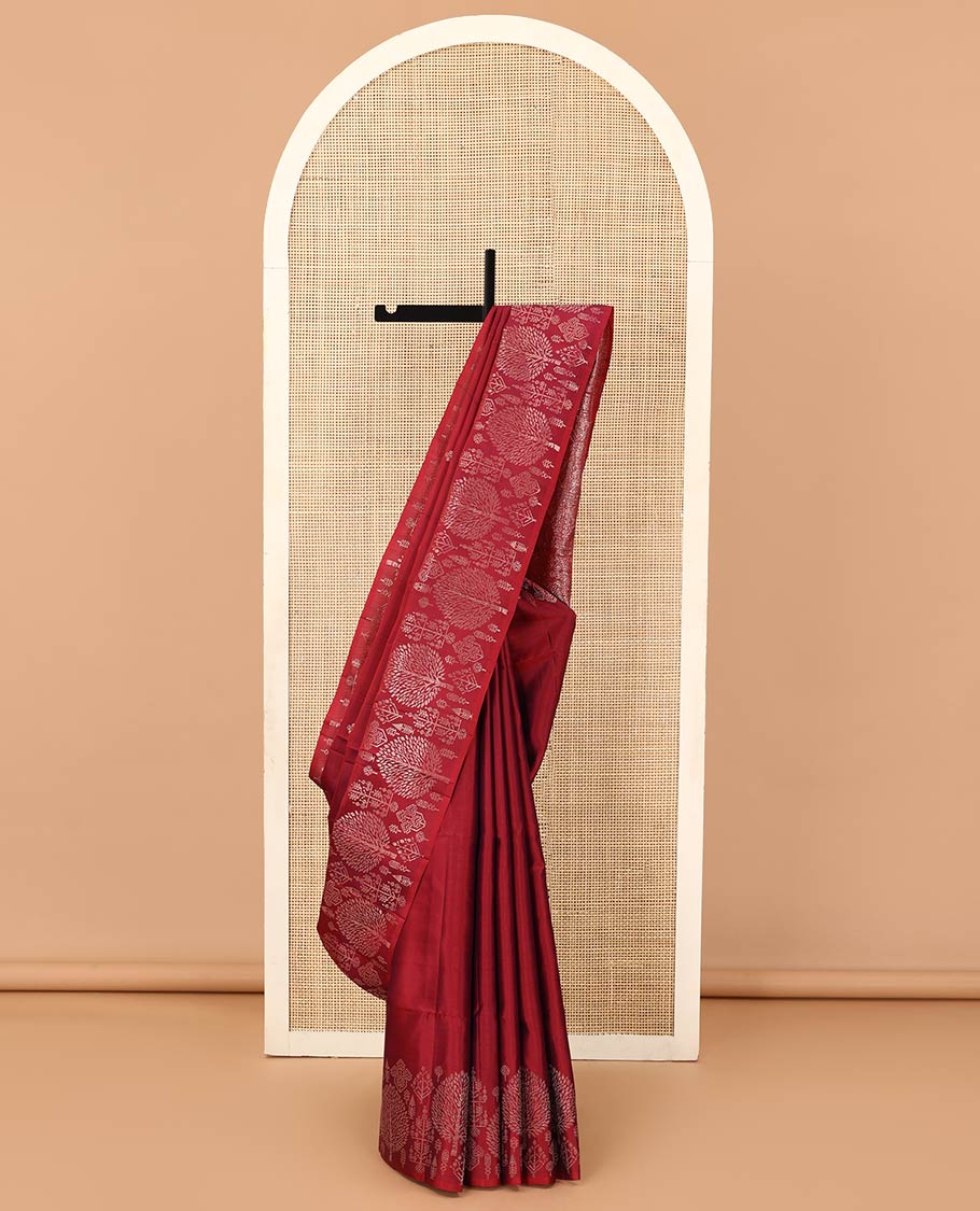 Red zari buttas soft silk saree, zari border of pine tree designs, and pallu of intricate designs