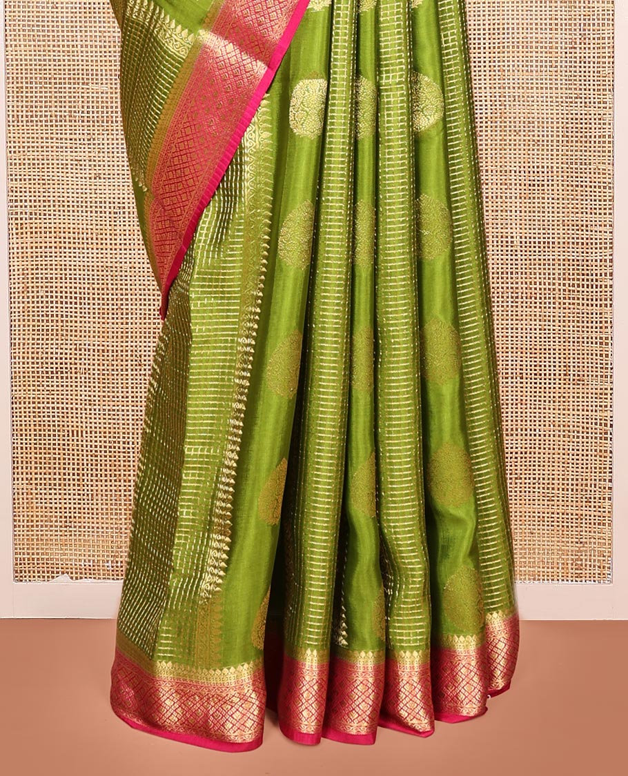 Green Mysore Silk Saree, Richly Detailed with Zari Buttas All Over Its Body, Complemented by a Contrast Traditional Zari Design Border, Pallu Steeped with Zari Stripes, and Paired with a Contrast Blouse