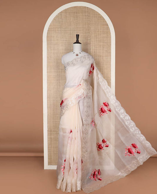 Cream rose motifs organza saree with self embroidery, scallop border