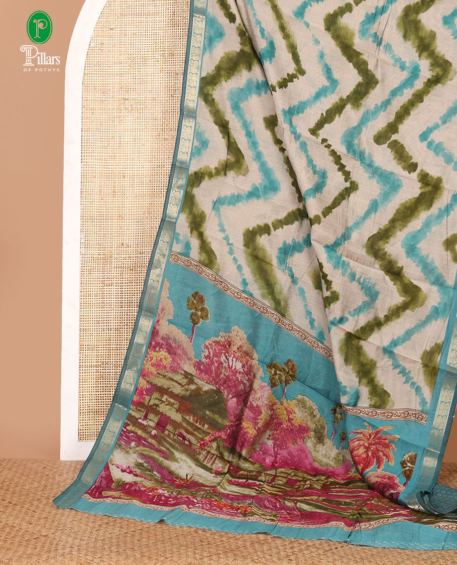 Blue zig-zag shibori printed Maheshwari silk saree,contrast peacock zari border, nature-theme scenery print pallu & butta print blouse