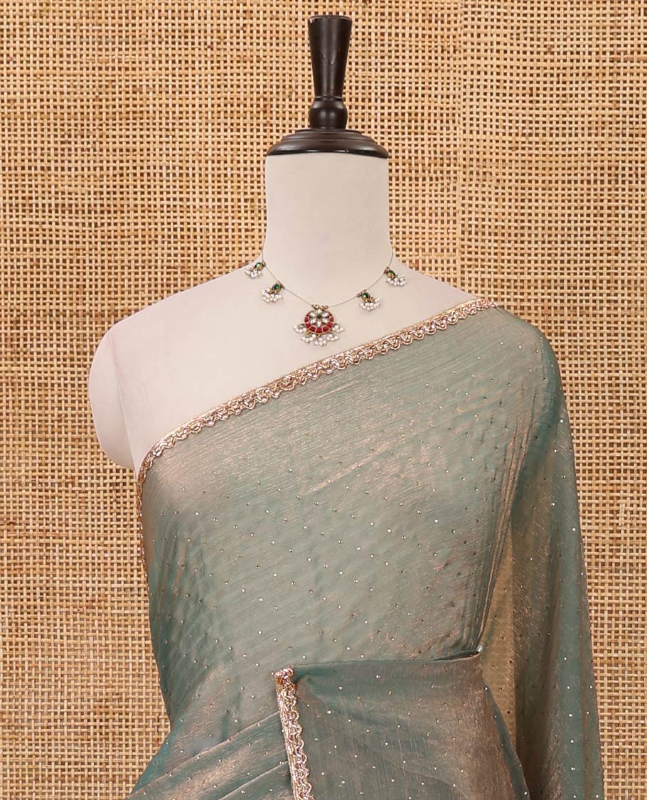 Blue Swarovski stone work embedded fendy-chiffon saree, scallop lace border & floral mixed embroidered blouse