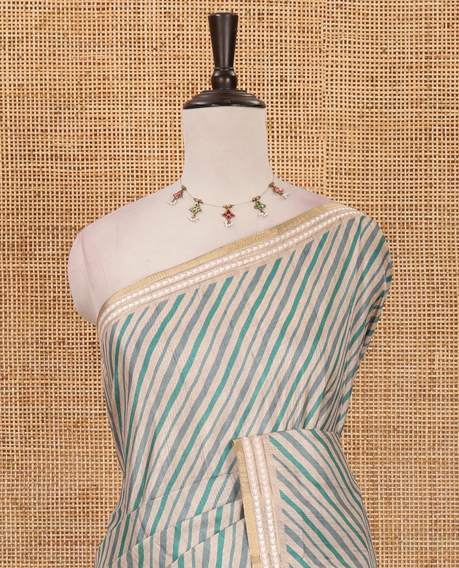 Peacock green lehariya-style striped semi-tussar saree, contrast resham thread triangle motifs border, diamond printed pallu & contrast printed blouse