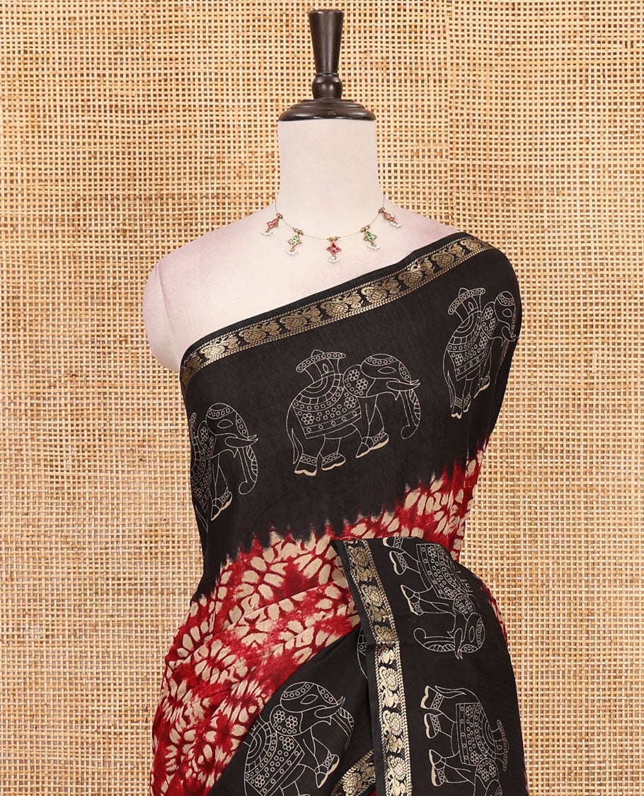 Maroon diamond patterns Shibori-style printed muslin cotton saree, contrast elephant motifs printed border, batik elephant motifs pallu & contrast flower buttas printed blouse