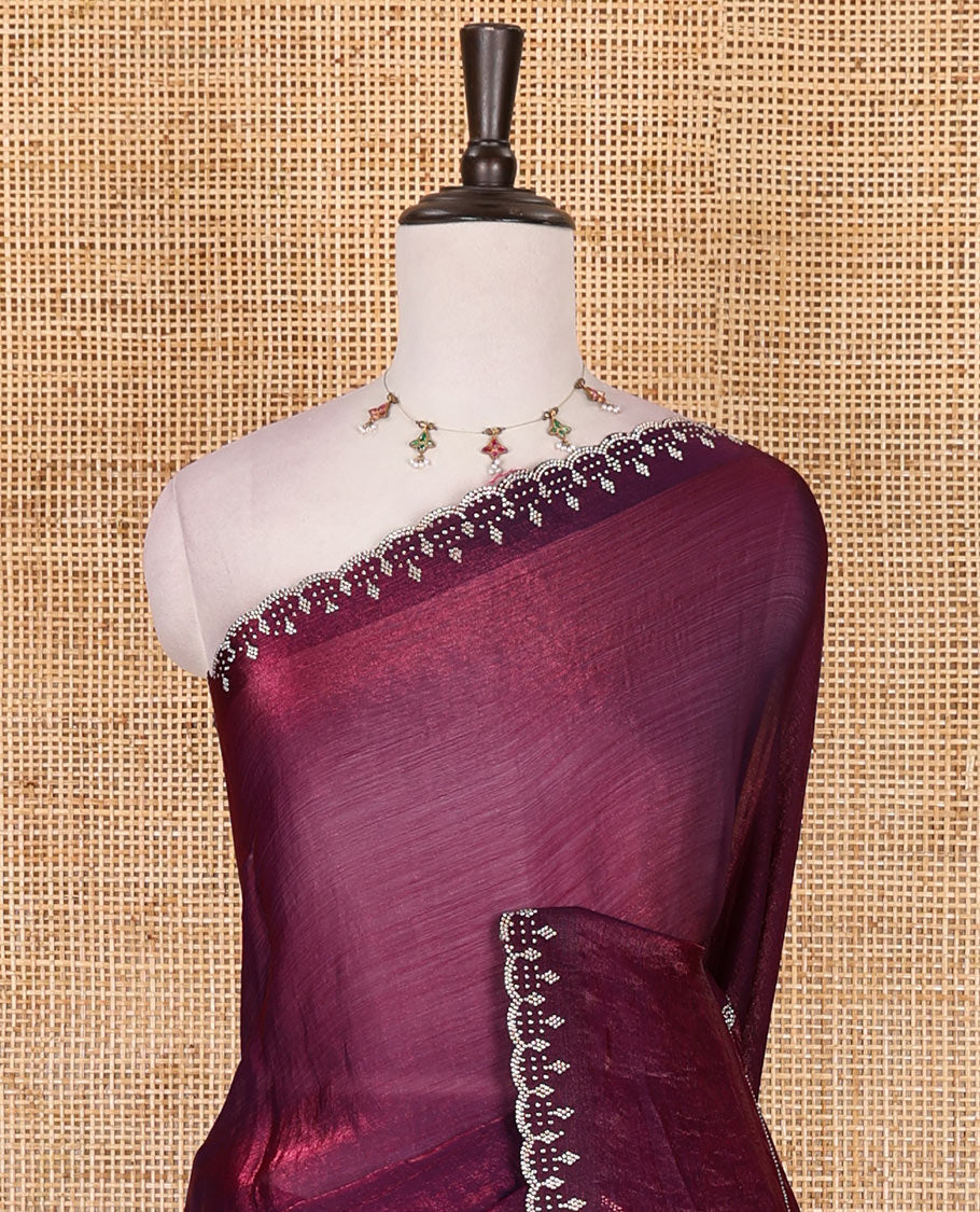 Wine micro stonework Fendi chiffon saree, scallop micro stonework border, stonework paisley pallu, and matching micro stone work blouse